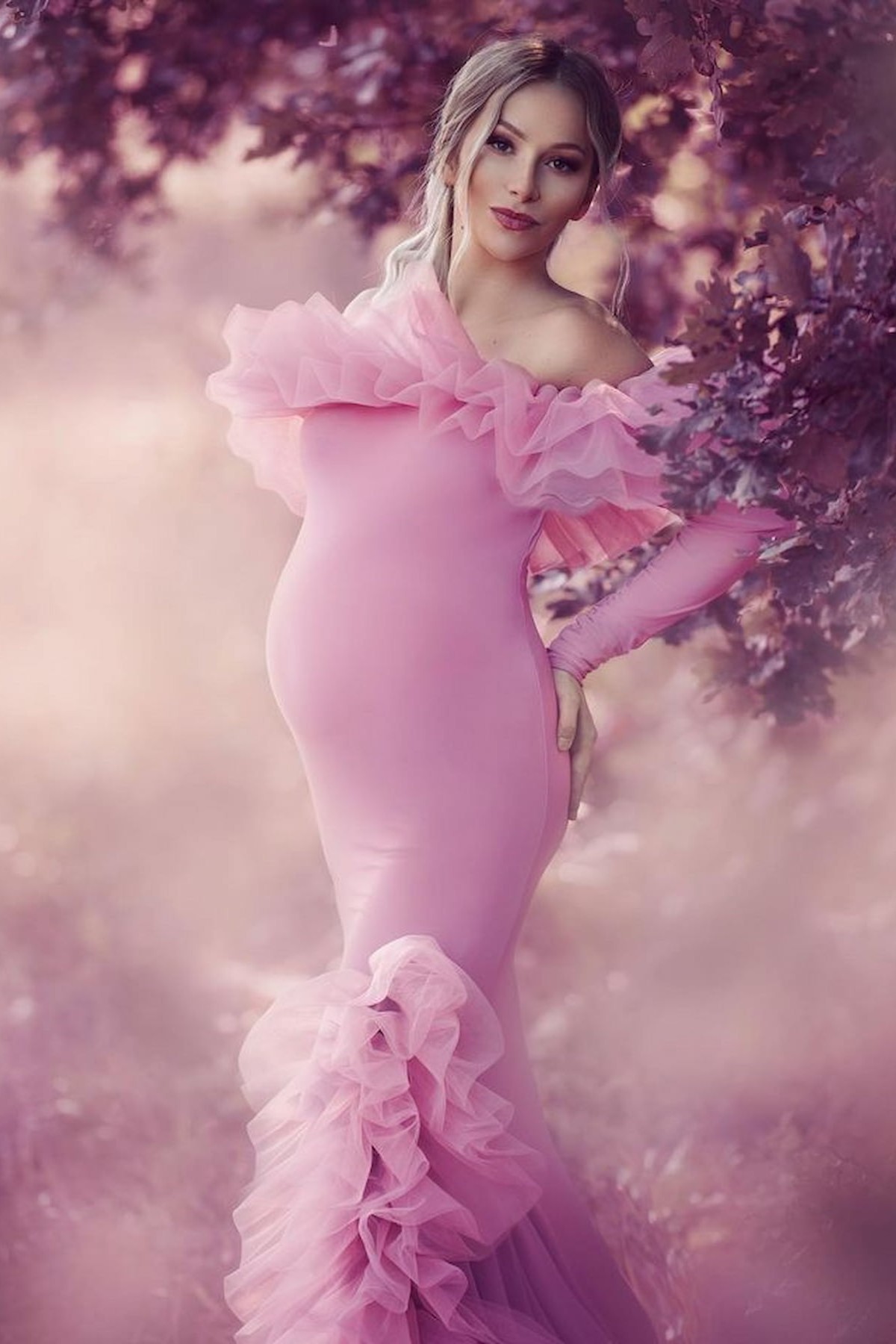 pregnant woman in elegant off shoulder dress with tulle detail outdoor photography