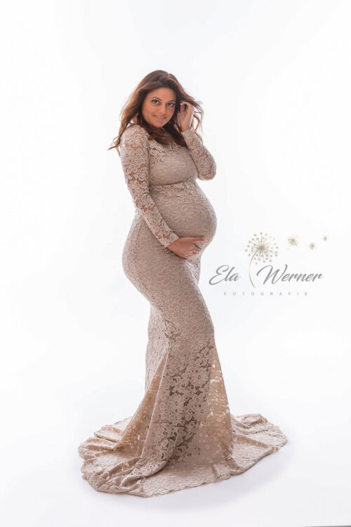 lace maternity gown long sleeve high neck fitted mermaid dress studio portrait