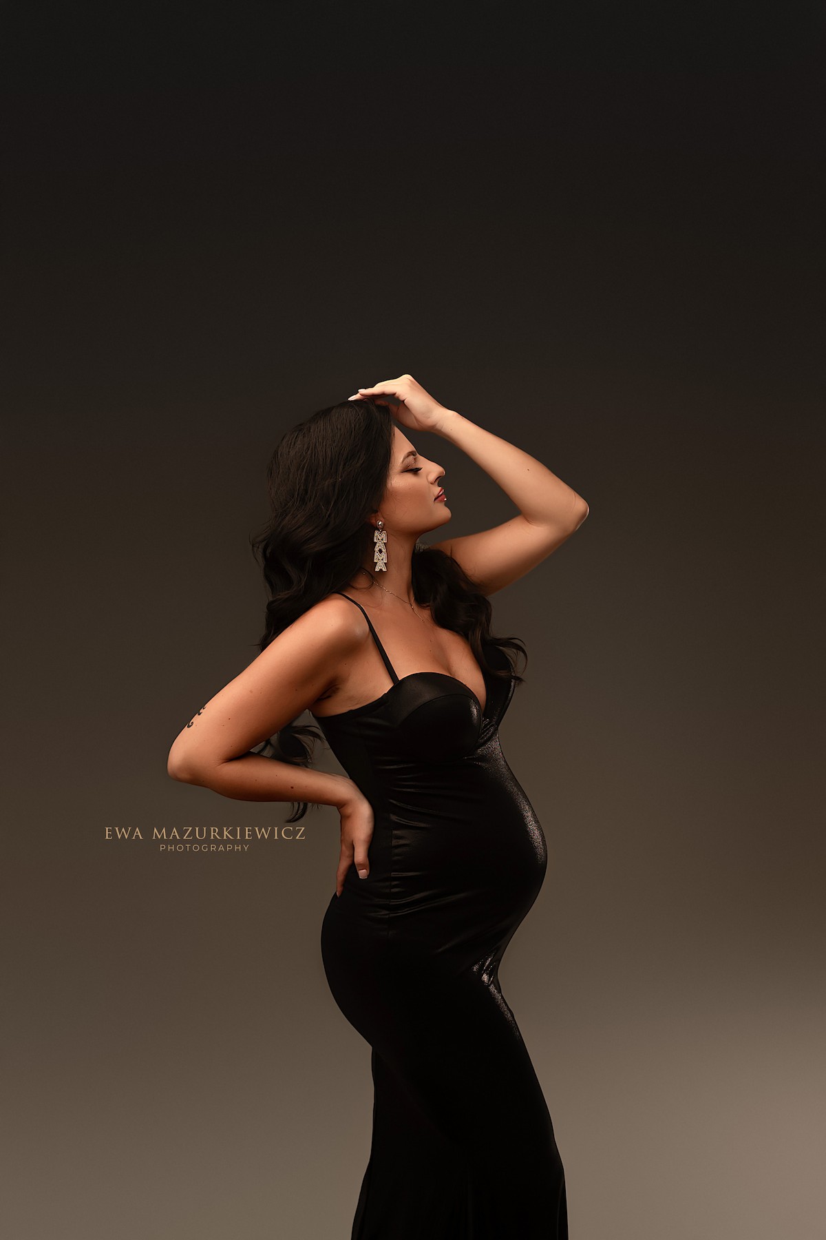 minimalist maternity gown with thin straps fitted mermaid dress studio portrait