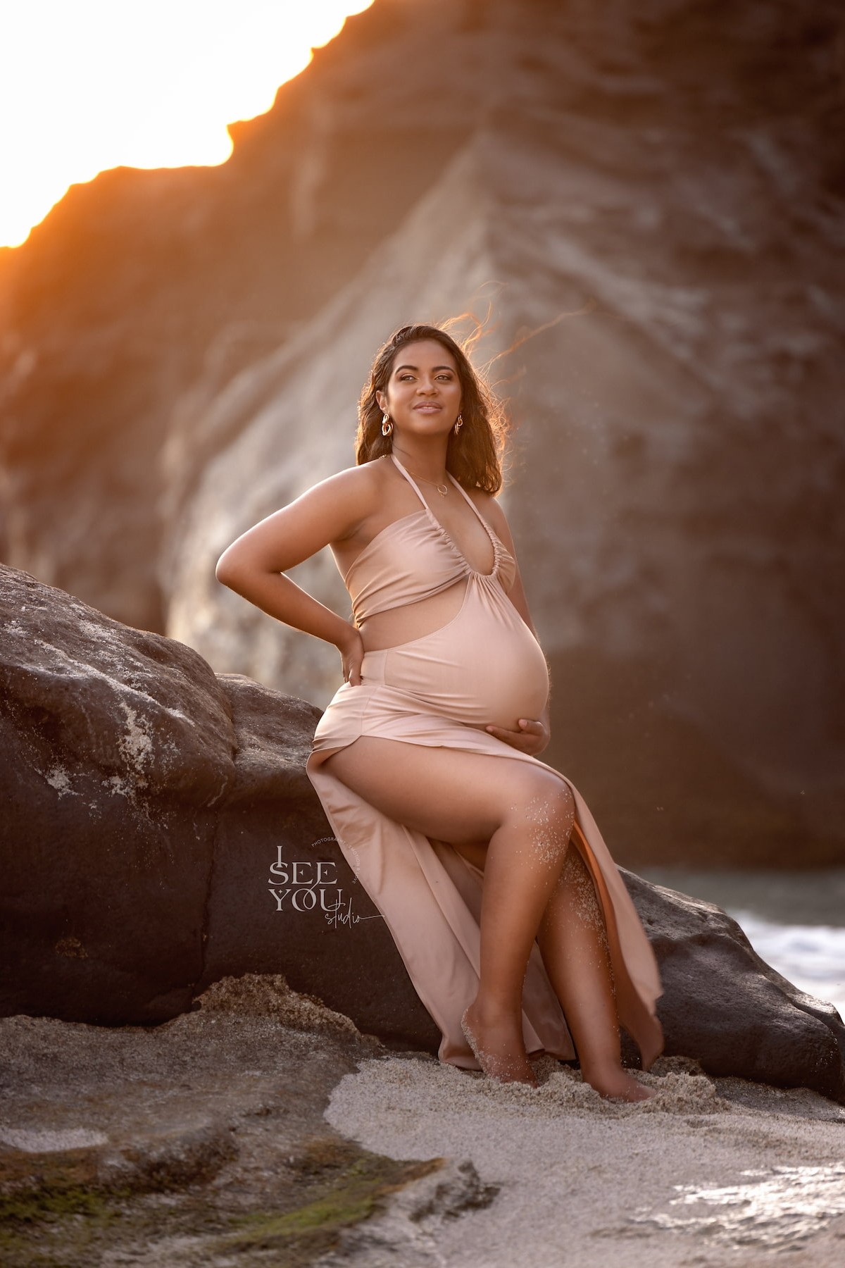 fitted maternity dress with side cut-outs and leg slit