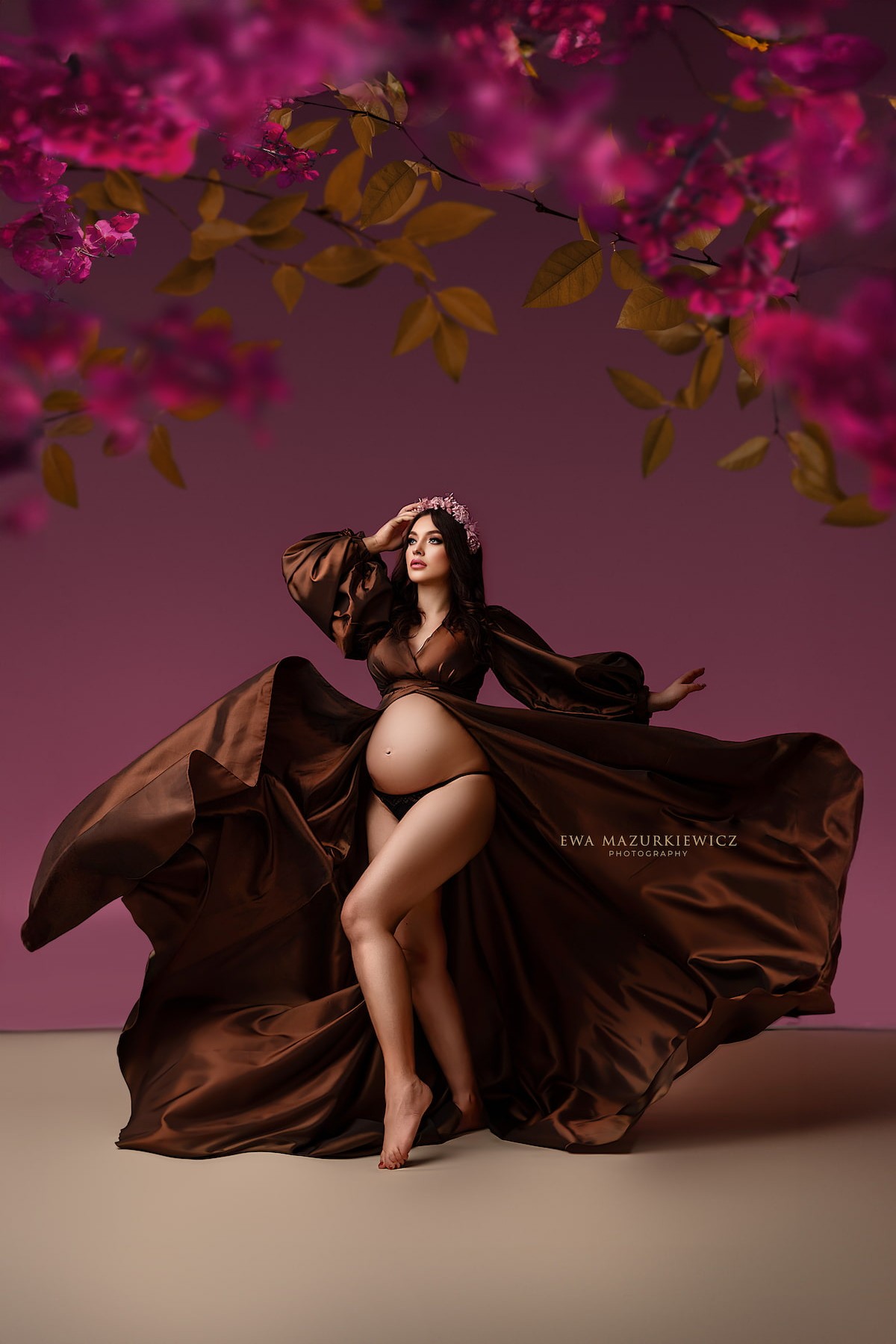 Maternity photoshoot dress with flowing fabric and long sleeves, open front design, fine art style