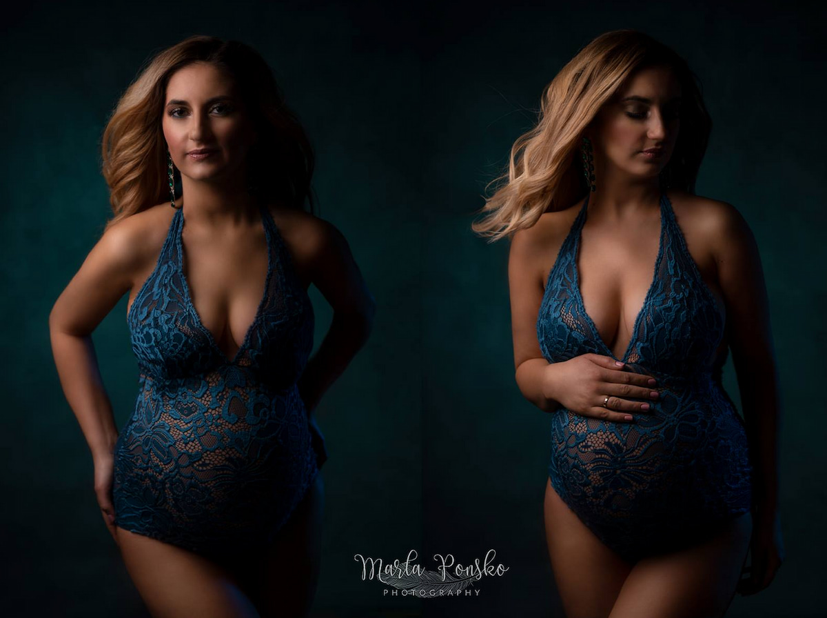 Pregnant woman in teal lace Sofia bodysuit, elegant studio maternity portrait