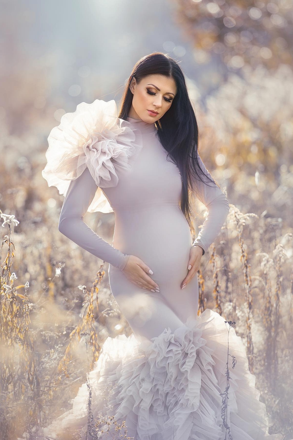 elegant maternity gown with layered tulle train