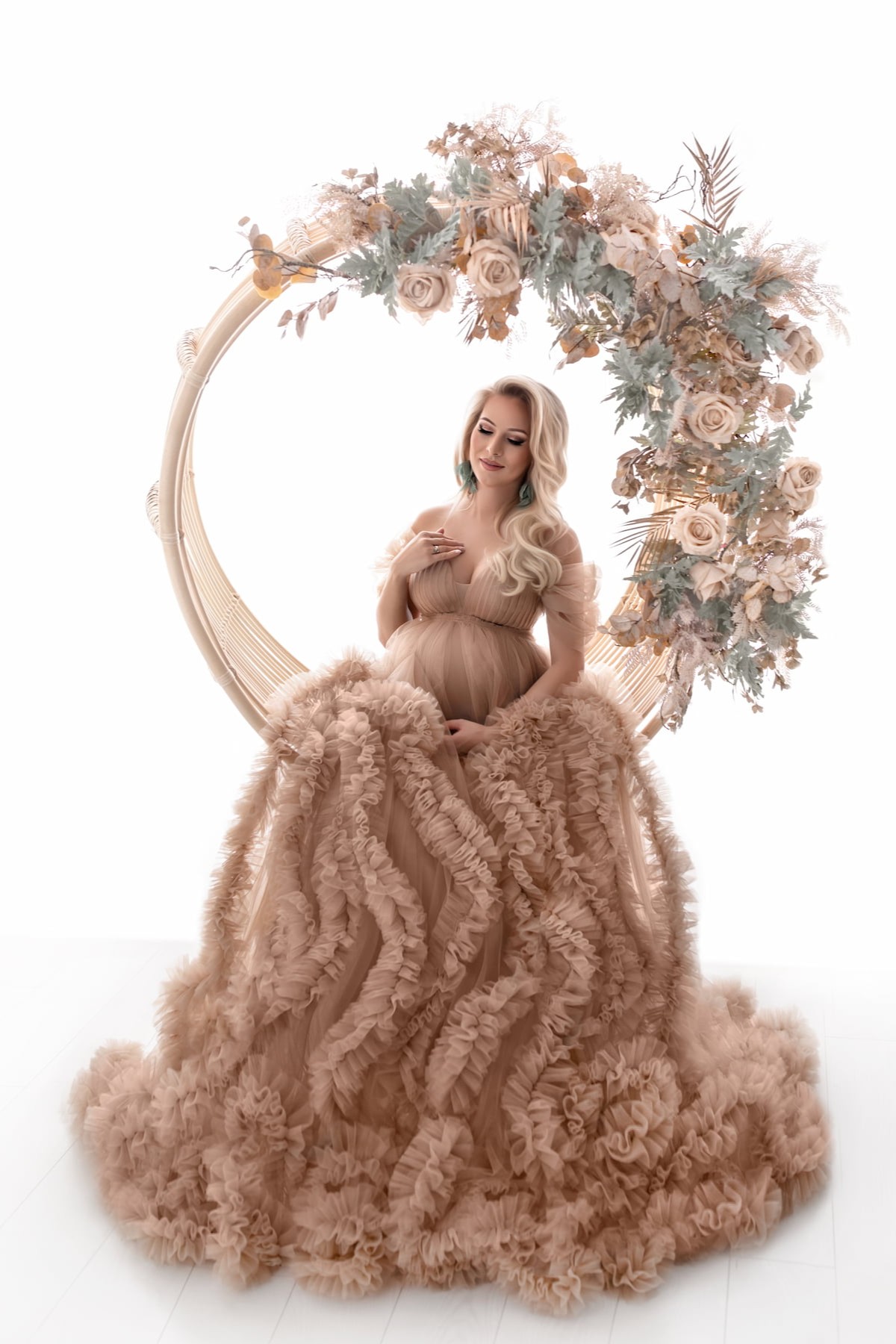 elegant maternity photoshoot in tulle pregnancy gown with long train