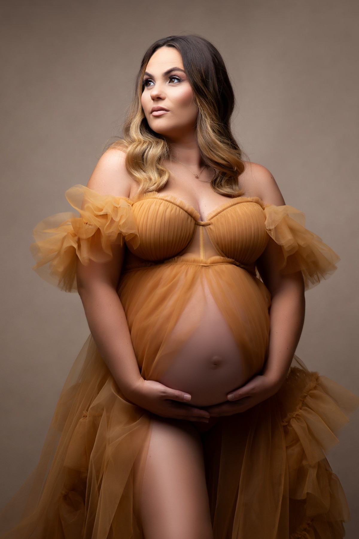 soft tulle maternity photoshoot gown with ruffle sleeves