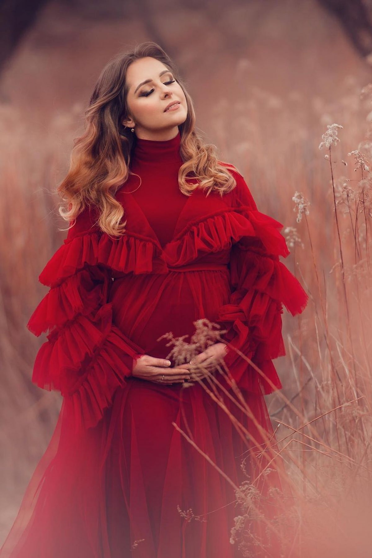 elegant maternity photoshoot gown with ruffles