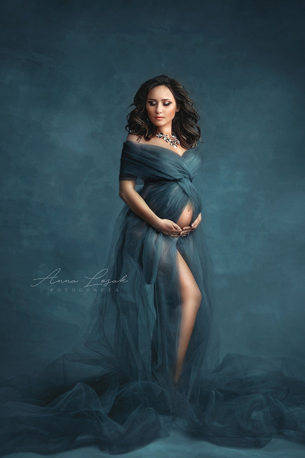 dark teal tulle maternity wrap elegant pregnancy photoshoot gown flowing fabric