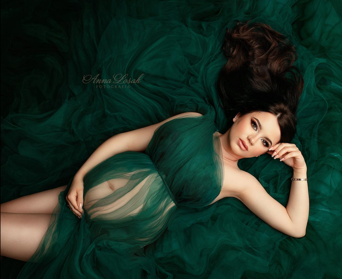 sheer tulle maternity wrap pregnancy photoshoot soft fabric elegant styling
